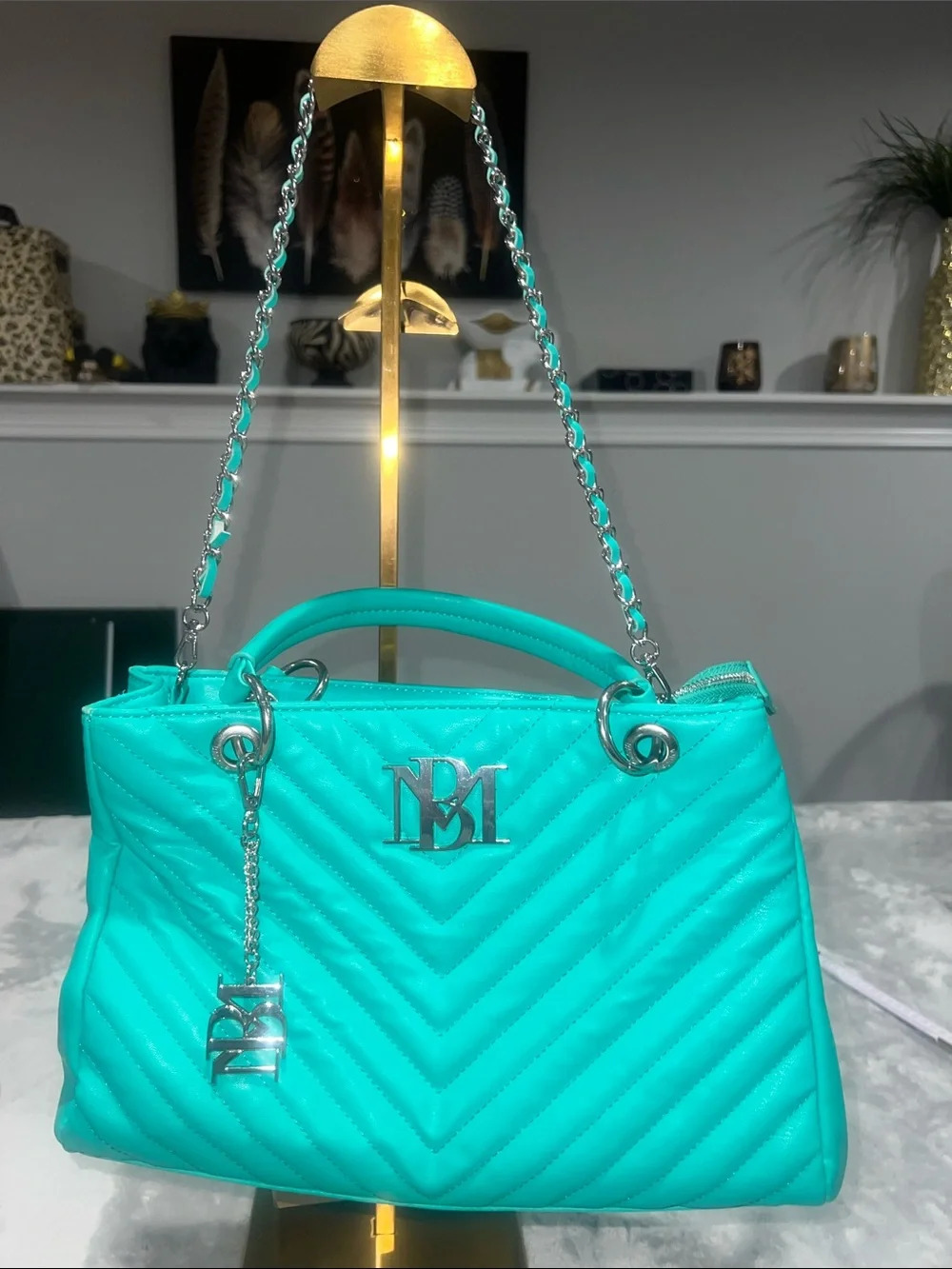 Badgley Mischka Chevron Quilted Shoulder Bag in a vibrant teal/mint green hue.